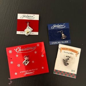 4 christmas charms new on packaging. Sterling silver